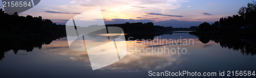 Image of Romantic sunset on the lake with fog