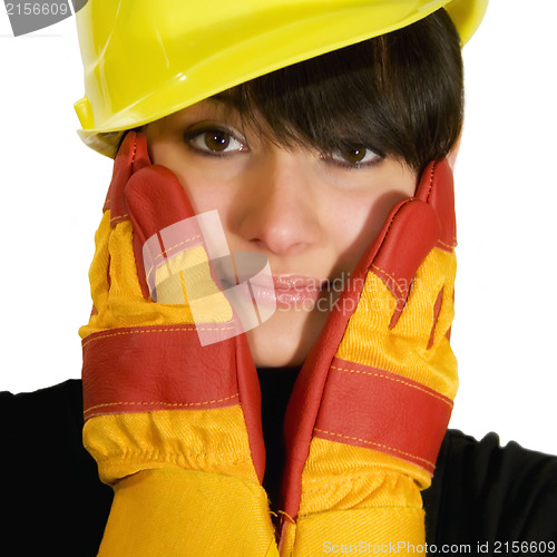 Image of Girl in yellow hard hat and red gloves