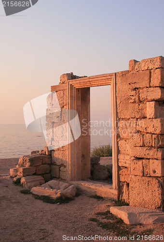Image of Ancient ruins near the sea at sunset