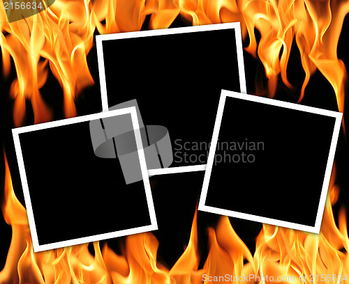 Image of Empty frames with fire flames background