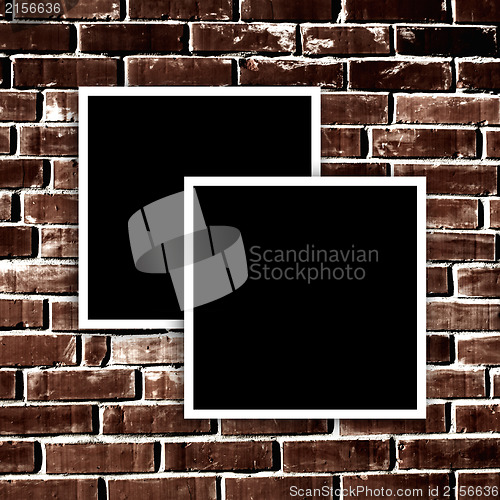 Image of Empty instant photos on grunge brick wall background