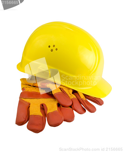 Image of Yellow hard hat, protective gloves and steel isolated