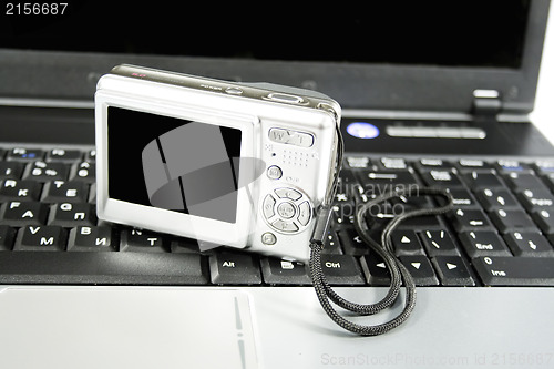 Image of Photocamera on a laptop