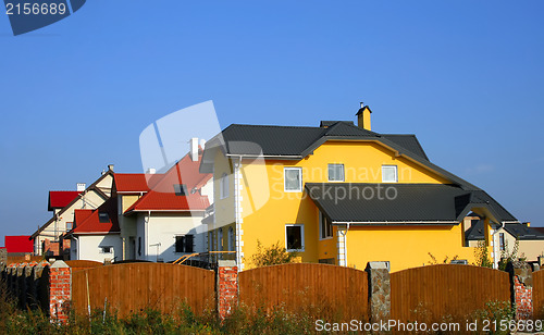 Image of Street with several houses at neighborhood.