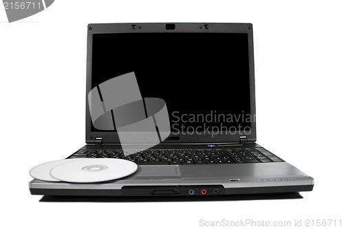 Image of White cd`s on a laptop isolated