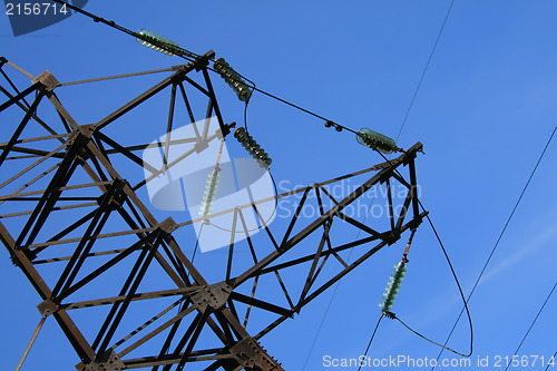 Image of Electric pylon with a blue sky background