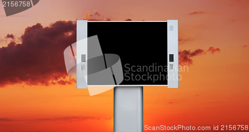 Image of Blank advertising billboard with sunset sky background