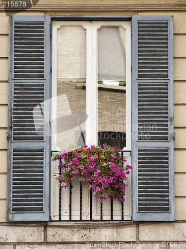 Image of Old window with flowers