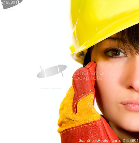 Image of Girl in yellow hard hat and red gloves