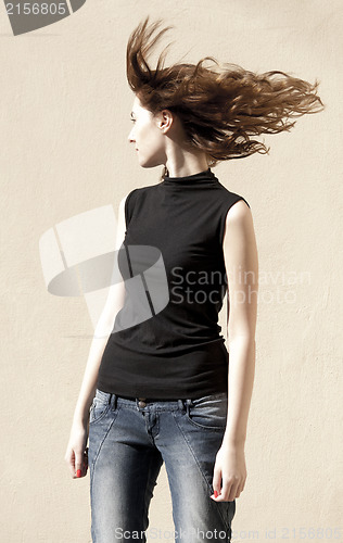 Image of Fashion portraits of a model with awesome shaking hair
