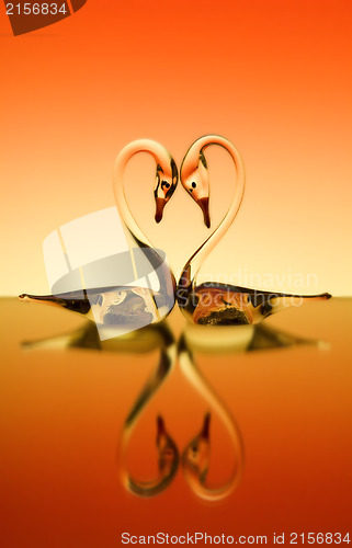 Image of St. Valentine background with two swans in love