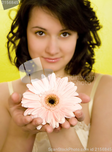 Image of Smelling a spring flower