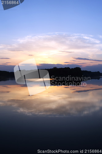 Image of Romantic sunset on the lake with fog