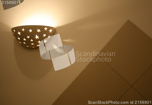 Image of Modern,abstract looking wall lamp (Sconce).