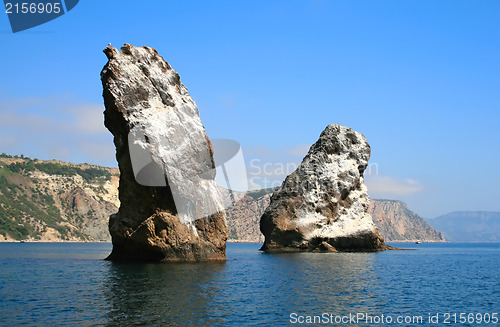 Image of Mountain on a rocky coastline.View from sea.