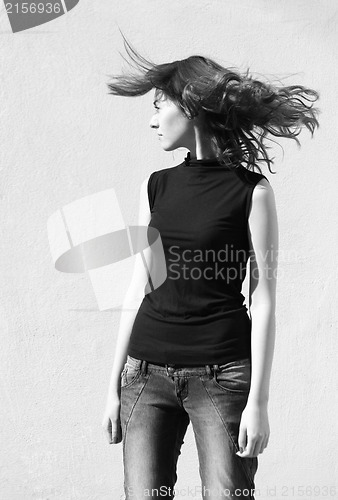 Image of Fashion portraits of a model with awesome shaking hair