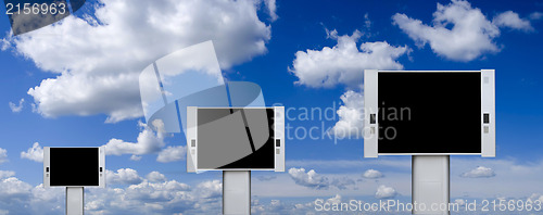 Image of Blank advertising billboards with blue sky background