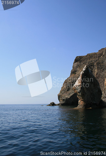 Image of Mountain on a rocky coastline.View from sea.