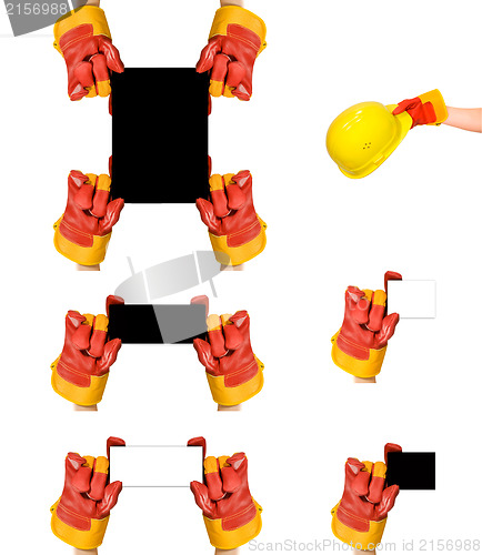 Image of Red protective gloves holding an empty frame.High resolution ima