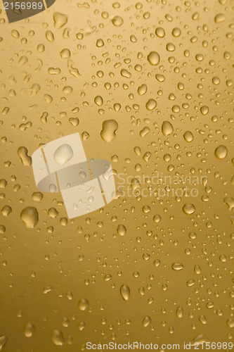 Image of Abstract orange drops of water background