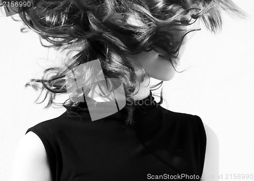 Image of Fashion portraits of a model with awesome shaking hair