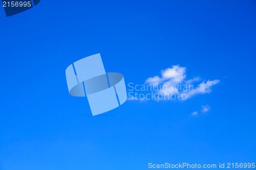 Image of Clear blue sky with one little cloud