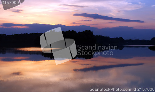Image of Romantic sunset on the lake with fog