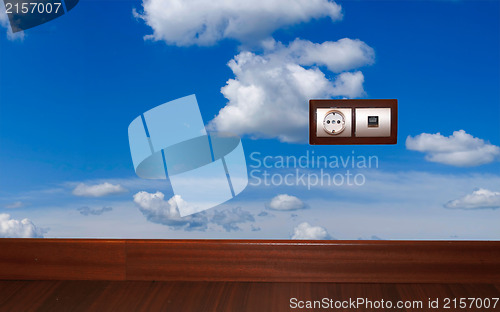 Image of Energy outlet with blue sky background