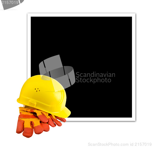 Image of Yellow hard hat and protective gloves isolated with empty frame