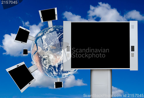 Image of Blank billboards on the earth with blue sky background