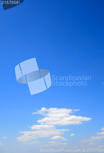 Image of Puffy clouds on blue sky