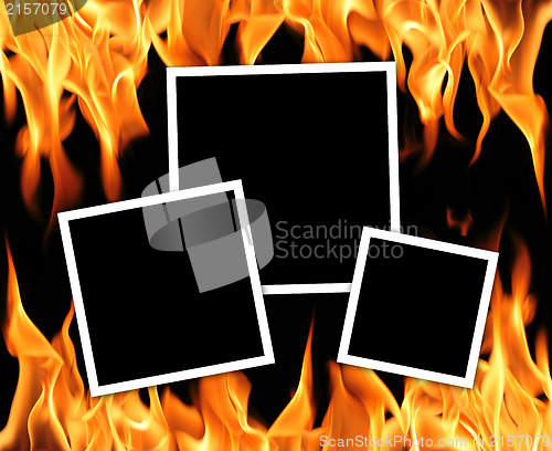 Image of Empty frames with fire flames background