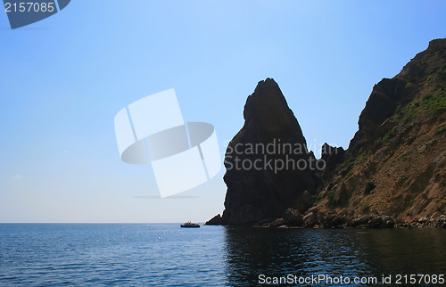 Image of Mountain on a rocky coastline.View from sea.