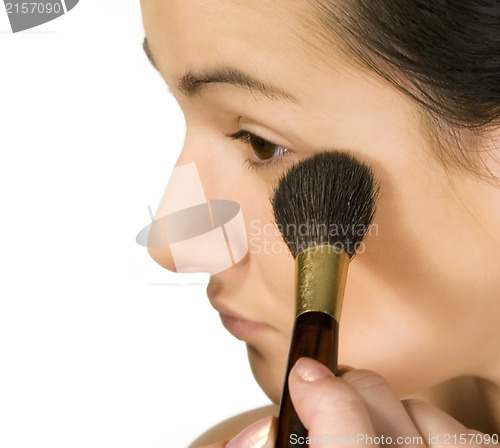 Image of Sexy girl putting make-up