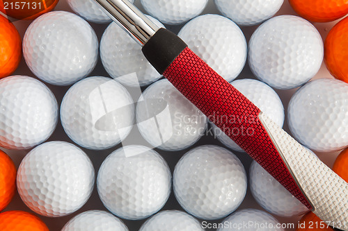 Image of Golf putter and balls