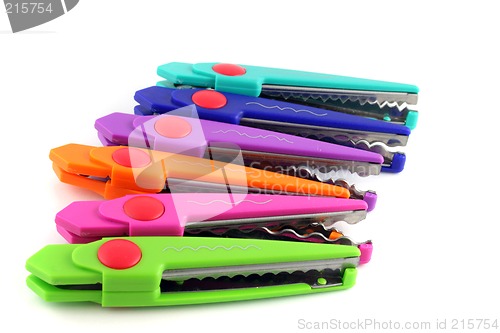 Image of Brightly colors craft scissors on a white background