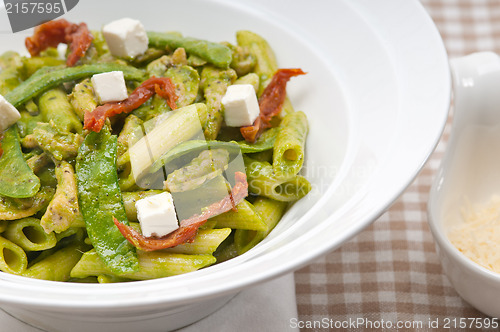 Image of Italian penne pasta with sundried tomato and basil