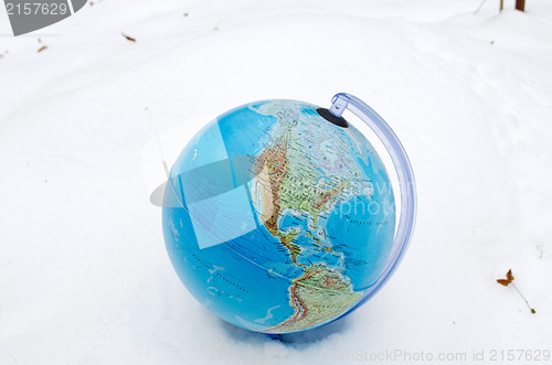 Image of earth globe sphere winter snow snowbank concept 