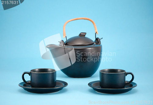 Image of morning drink dish retro teapot cups saucers blue 