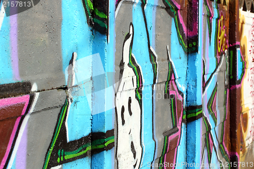 Image of graffiti on a concrete fence