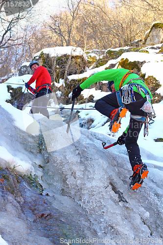 Image of team of mountaineers heading to the summit
