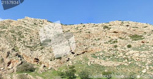 Image of Texture of a layered sedimentary rock under the blue sky