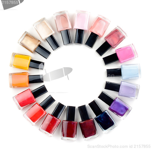 Image of Coloured nail polish bottles stacked circle