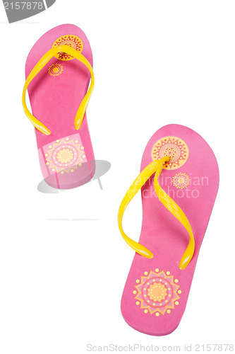 Image of orange flip-flops with flowers