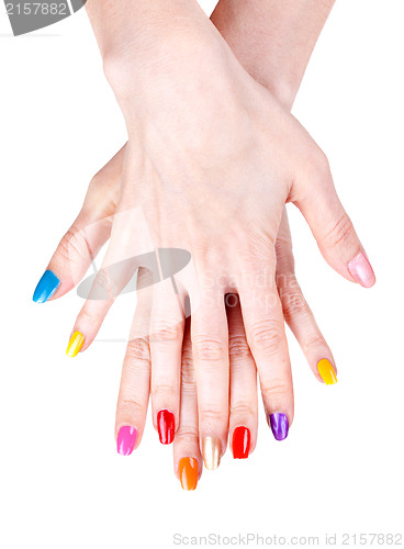 Image of Women's hands with a colored nail polish