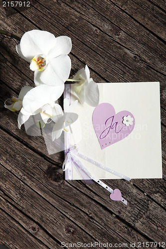 Image of Pretty Valentine card with heart and flowers