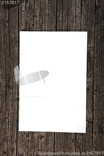 Image of Blank paper on weathered wood