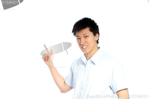 Image of Asian man pointing to blank copyspace