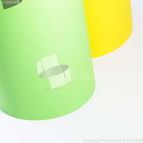 Image of Rolls of yellow and green cardboard