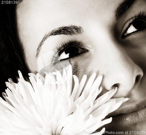 Image of Girl with a white flower